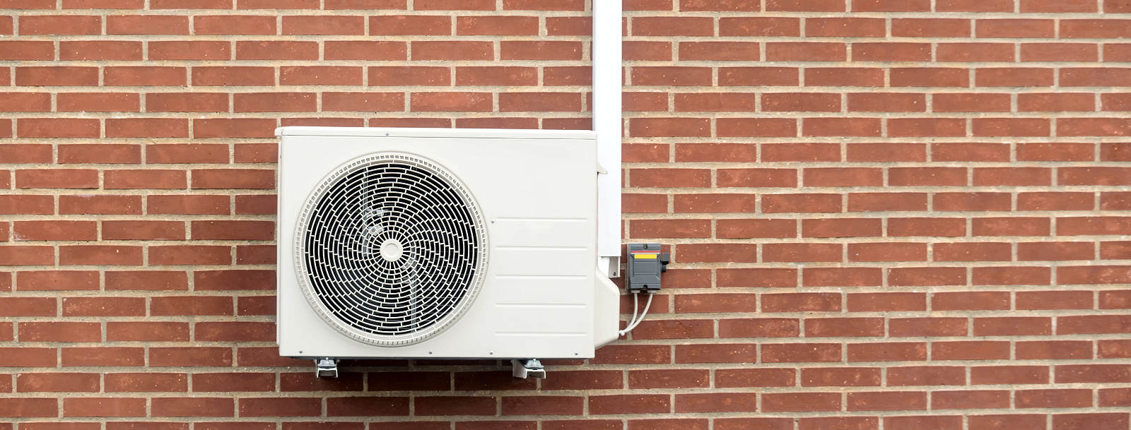 Air source heat pump installed externally